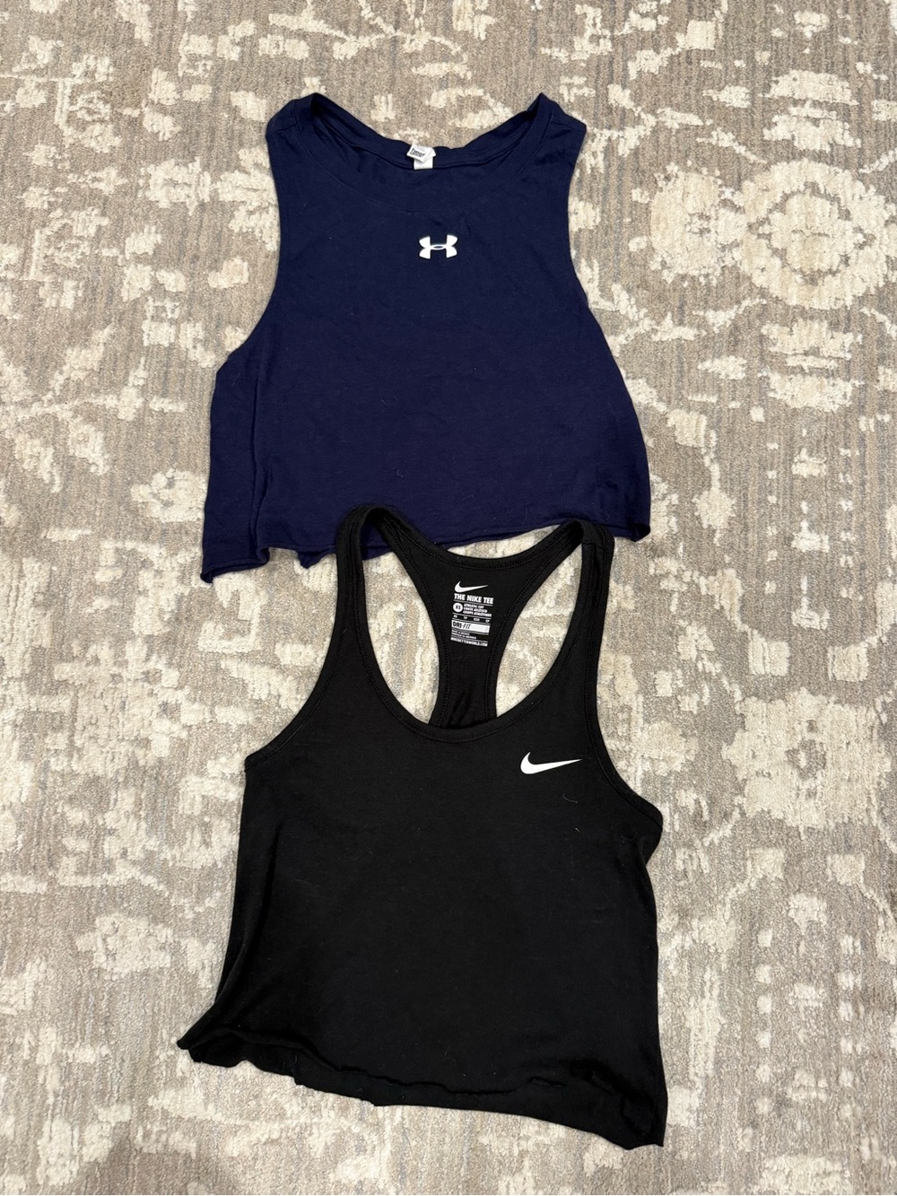 Nike Black Racerback Crop Tank Top and blue under armour crop tank